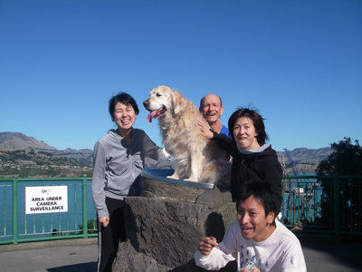 Japanese guests with dog at Lyttleton Harbour